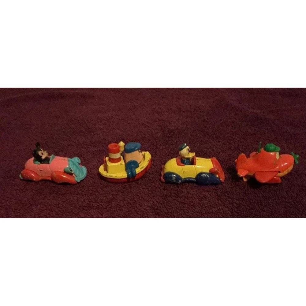 Lot Of 4 1970s Walt Disney Production Tomica Die Cast Cars, Boat & Airplane